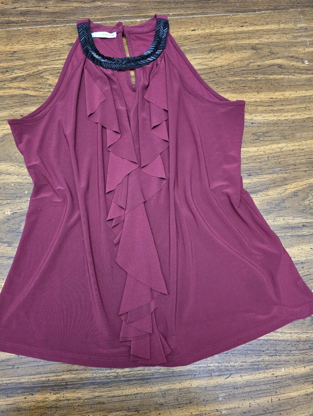 burgundy Maurices halter blouse with a distinct beaded neckline